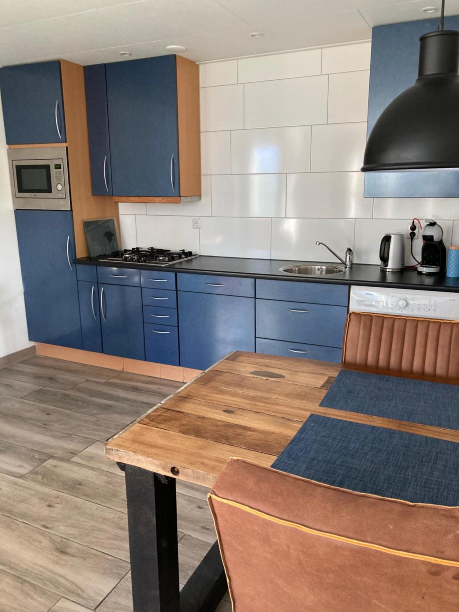 Bungalow Op Bedrijf Met Melkkoeien De Cocksdorp  Exterior foto